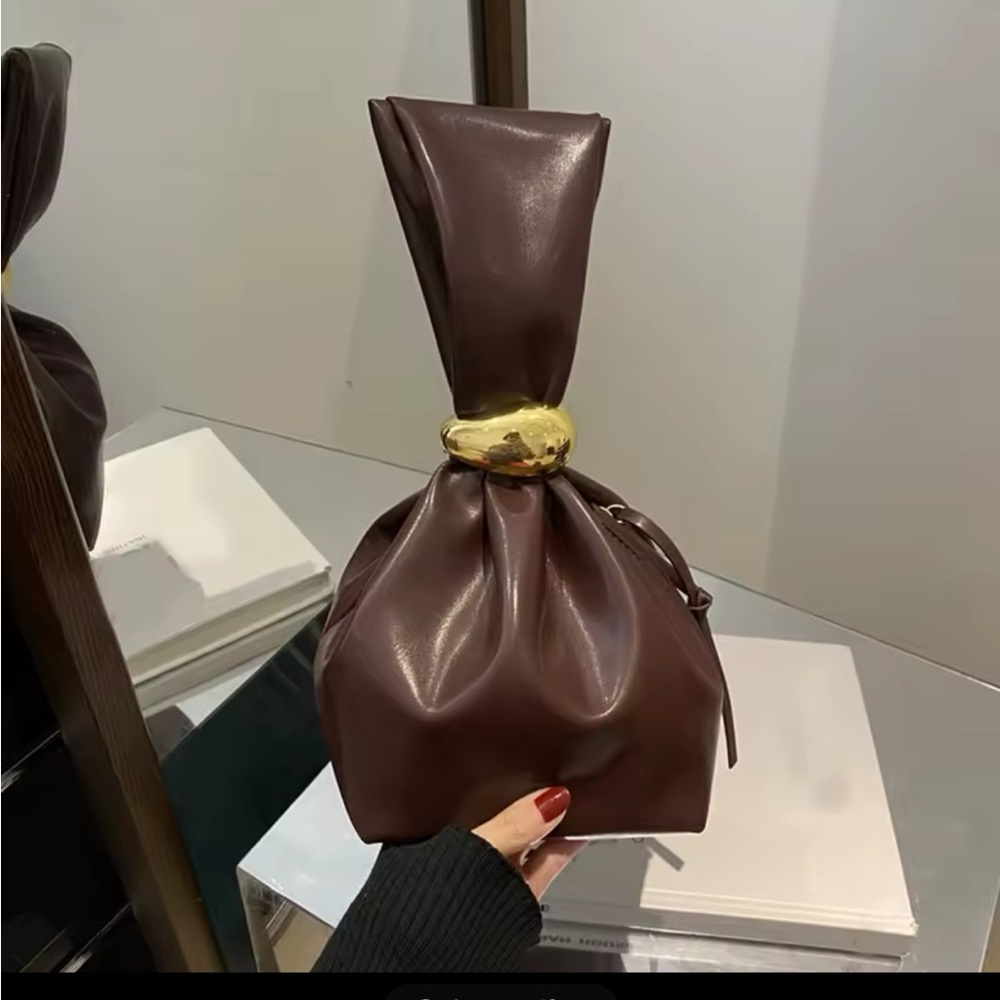 Elegant Brown Leather Bag with Gold Accent